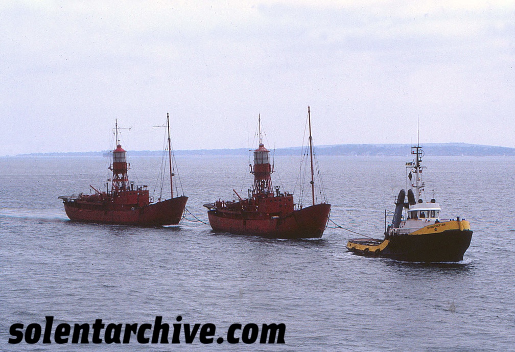 Lightships under tow
