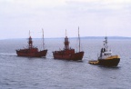 Lightships under tow
